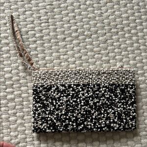Elegant Beaded Clutch in Black and White